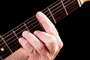 How to Play a C Minor Chord on Guitar [Easy Hacks You Can’t Miss] - On