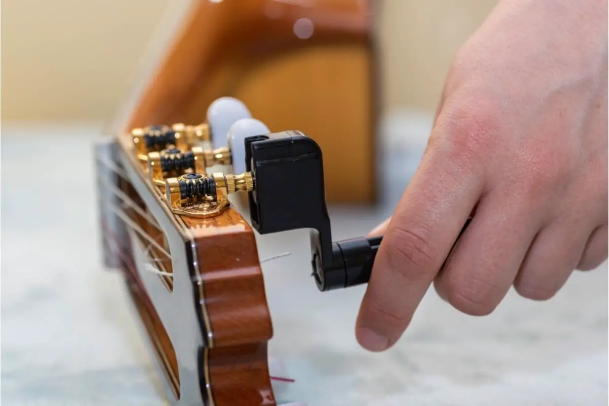 How To String A Guitar [The Best Way To Change Strings!]