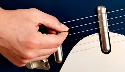 Do Metal Picks Damage Strings